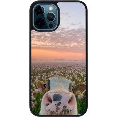 Coque iPhone 12 / 12 Pro - Silicone rigide noir Cow with tulips 2026
