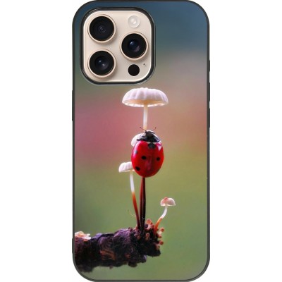 Coque iPhone 16 Pro - Silicone rigide noir Ladybird on a mushroom Spring 2026