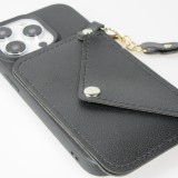 Coque iPhone 14 Pro - Silicone soft touch avec pochette à cartes ou argent en cuir et lanière intégrée - Noir