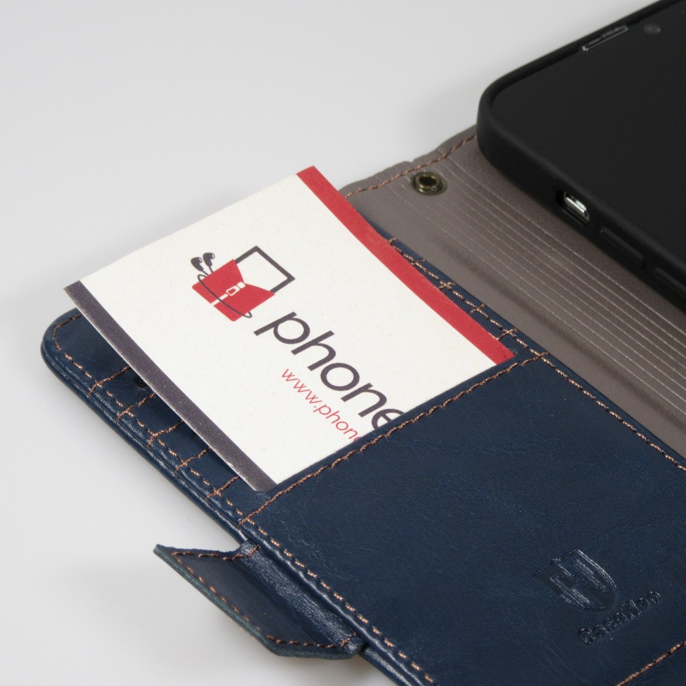 Etui cuir iPhone 16e - Flip Wallet en cuir véritable avec stripe design et compartiment à cartes - Bleu