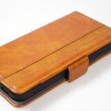 Etui cuir iPhone 16e - Flip Wallet en cuir véritable avec stripe design et compartiment à cartes - Brun