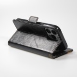 Etui cuir iPhone 16e - Flip Wallet en cuir véritable avec stripe design et compartiment à cartes - Noir