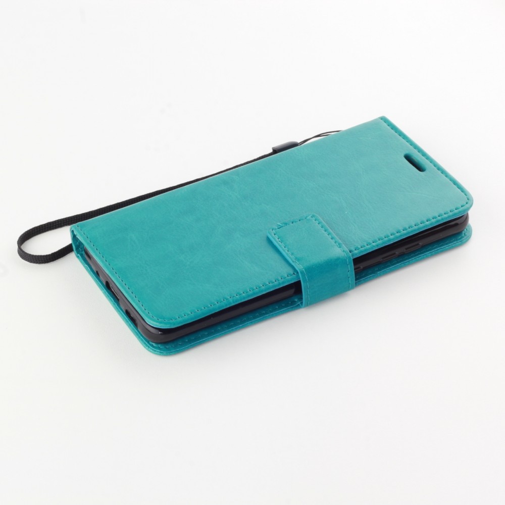Fourre Samsung Galaxy S24 - Premium Flip cuir lisse porte-cartes - Turquoise