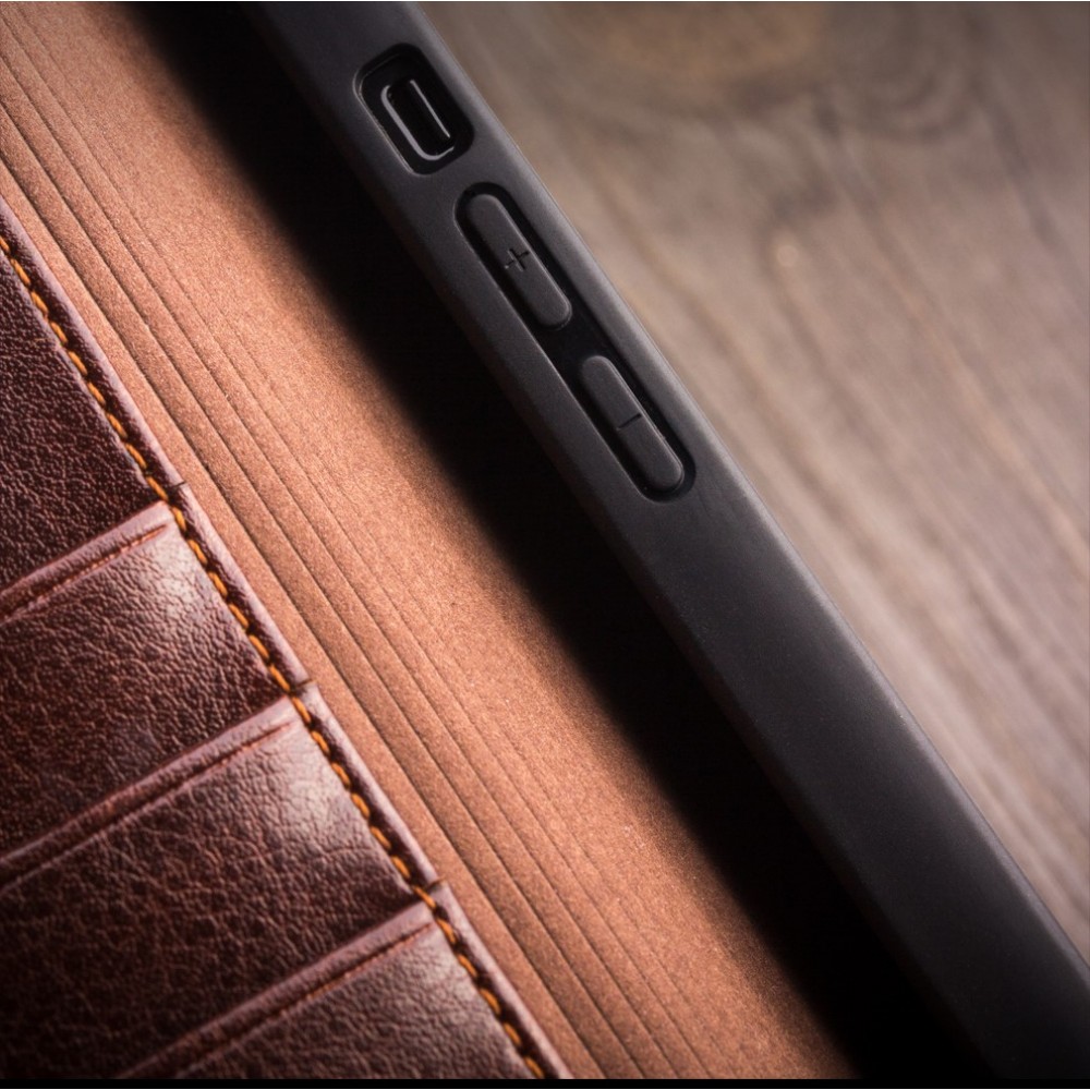 Fourre iPhone 15 - Flip Qialino cuir véritable - Noir
