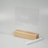 Tableau de messages transparent avec lumière LED et socle en bois