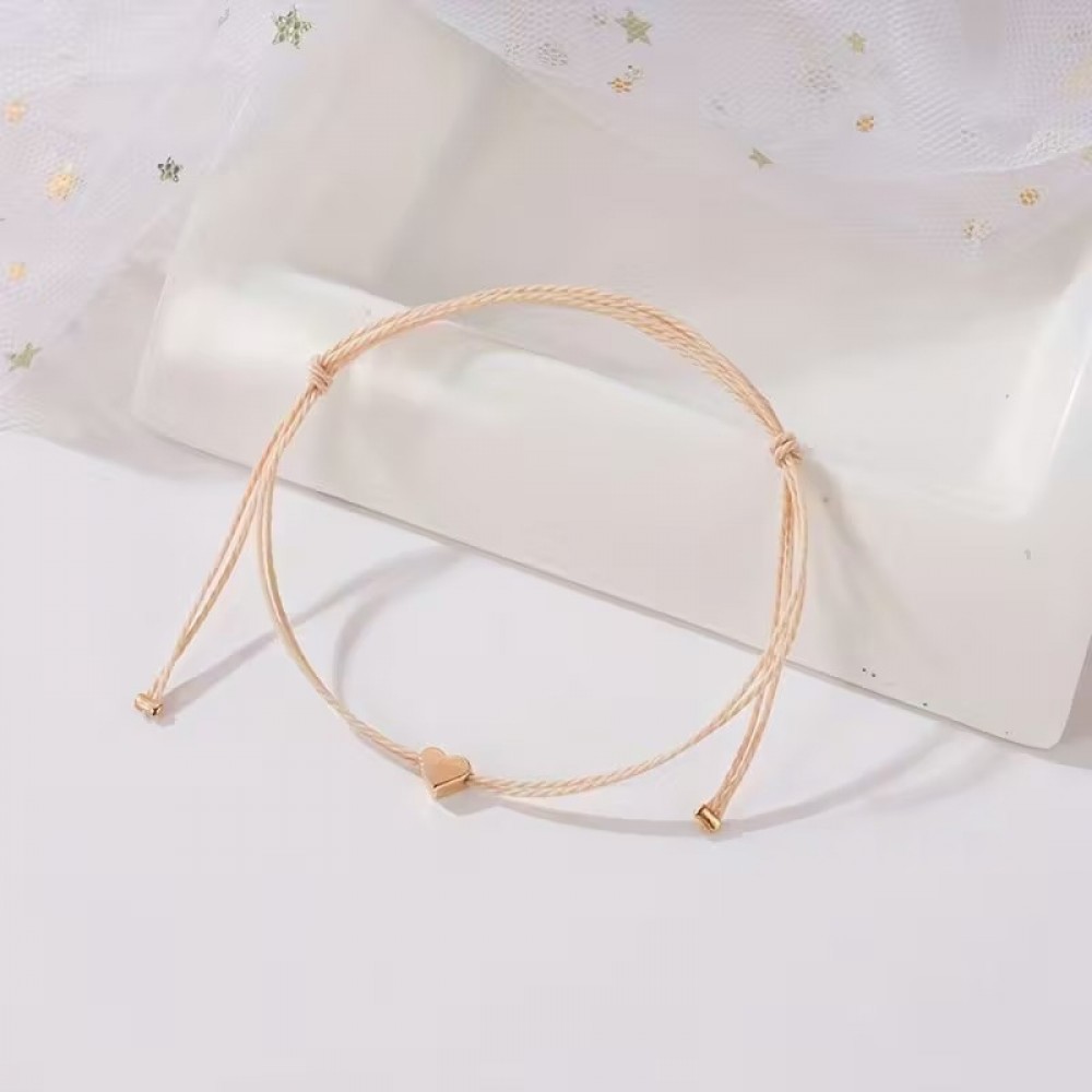 Bracelet mini cœur doré en tissu avec des perles ajustables chic pour fêtes et occasions spéciales - Or