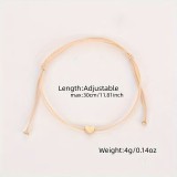 Bracelet mini cœur doré en tissu avec des perles ajustables chic pour fêtes et occasions spéciales - Or