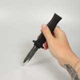 Faux couteau rétractable jouet pour effrayer - Noir