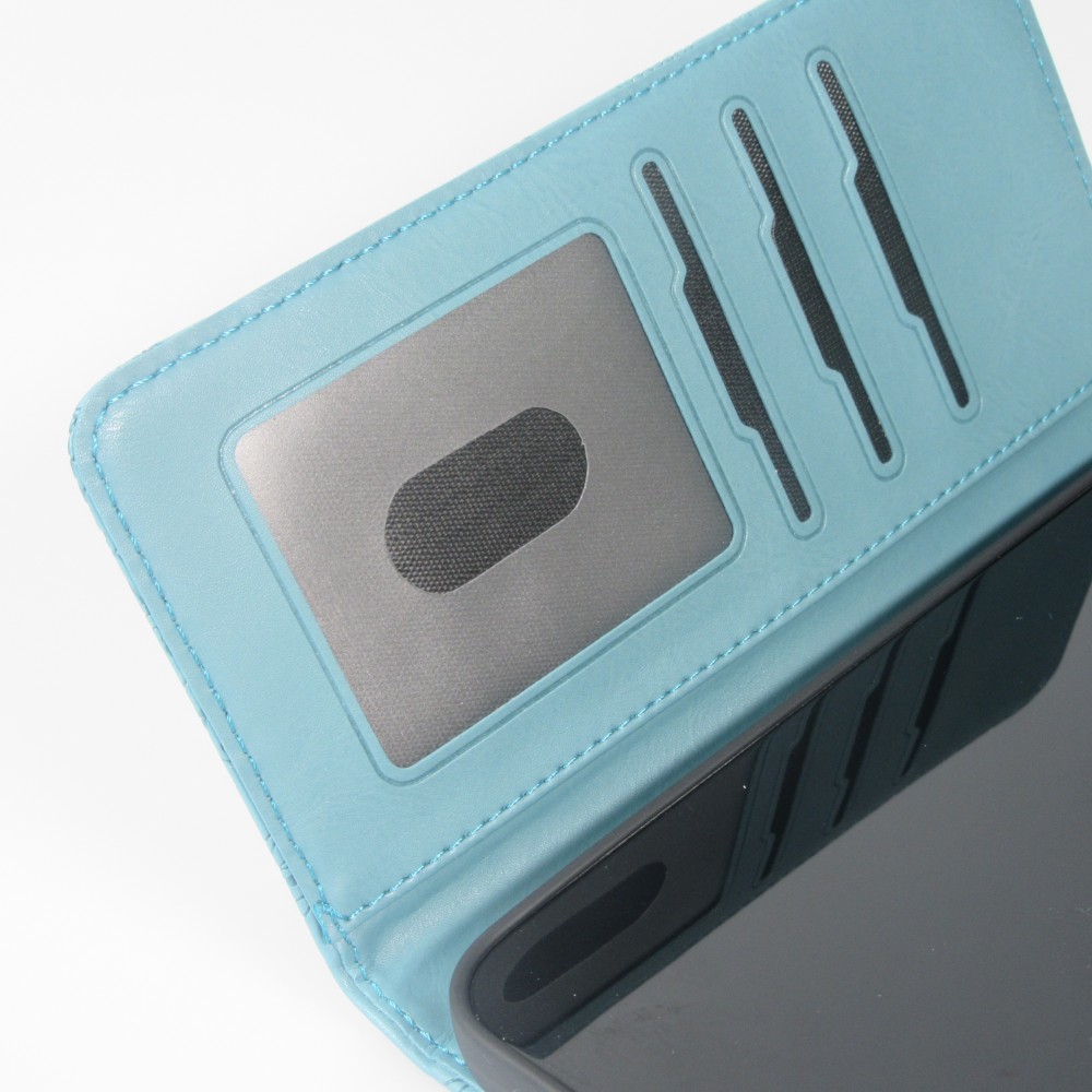 Fourre iPhone 16 Pro - Flip porte-cartes dessins fleurs avec lani&egrave;re - Bleu fonc&eacute;