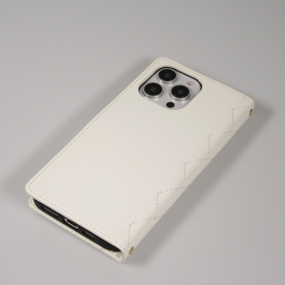 Fourre iPhone 16 Pro Max - Flip matelass&eacute; &eacute;l&eacute;gant avec fermeture magn&eacute;tique et lani&egrave;re et emplacements pour cartes - Blanc
