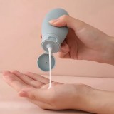 3er Set wiederverwendbare Silikon-Reiseflaschen für Kosmetik und Pflege (60 ml) - Fluggeeignet - Multicolore