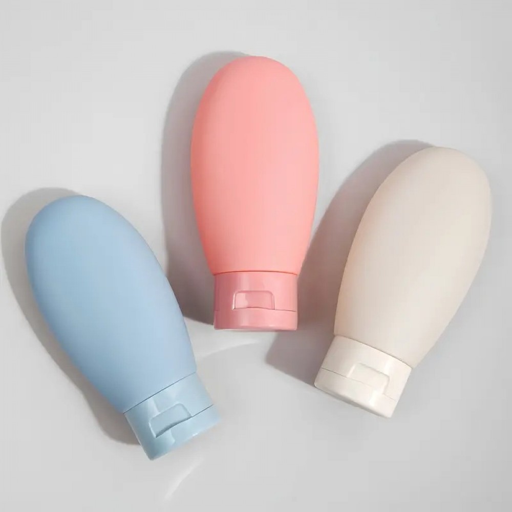 3er Set wiederverwendbare Silikon-Reiseflaschen für Kosmetik und Pflege (60 ml) - Fluggeeignet - Multicolore