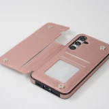Coque Samsung Galaxy S24 - Etui en silicone avec surface en similicuir et porte-monnaie pliable - Rose