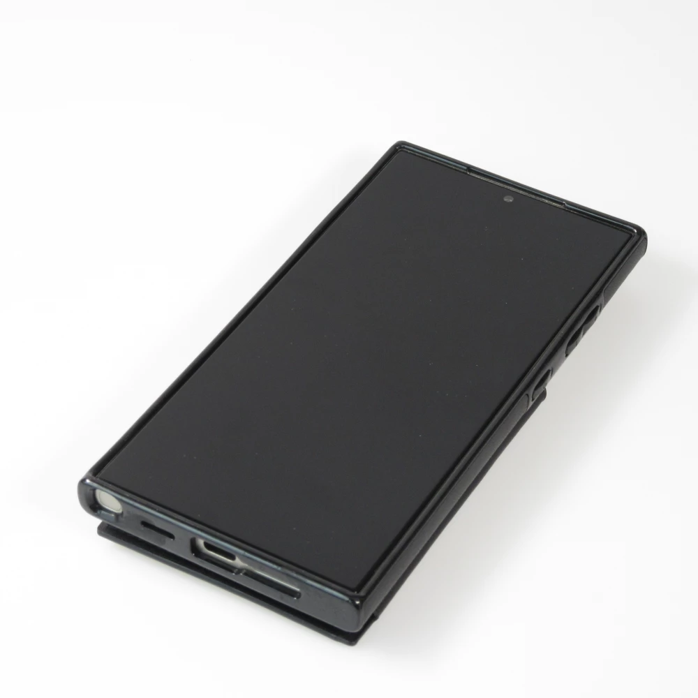 Coque Samsung Galaxy S24 Ultra - Etui en silicone avec surface en similicuir et porte-monnaie pliable - Noir