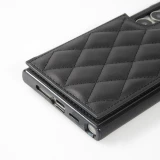 Coque Samsung Galaxy S24 Ultra - Etui en silicone avec surface en similicuir et porte-monnaie pliable - Noir
