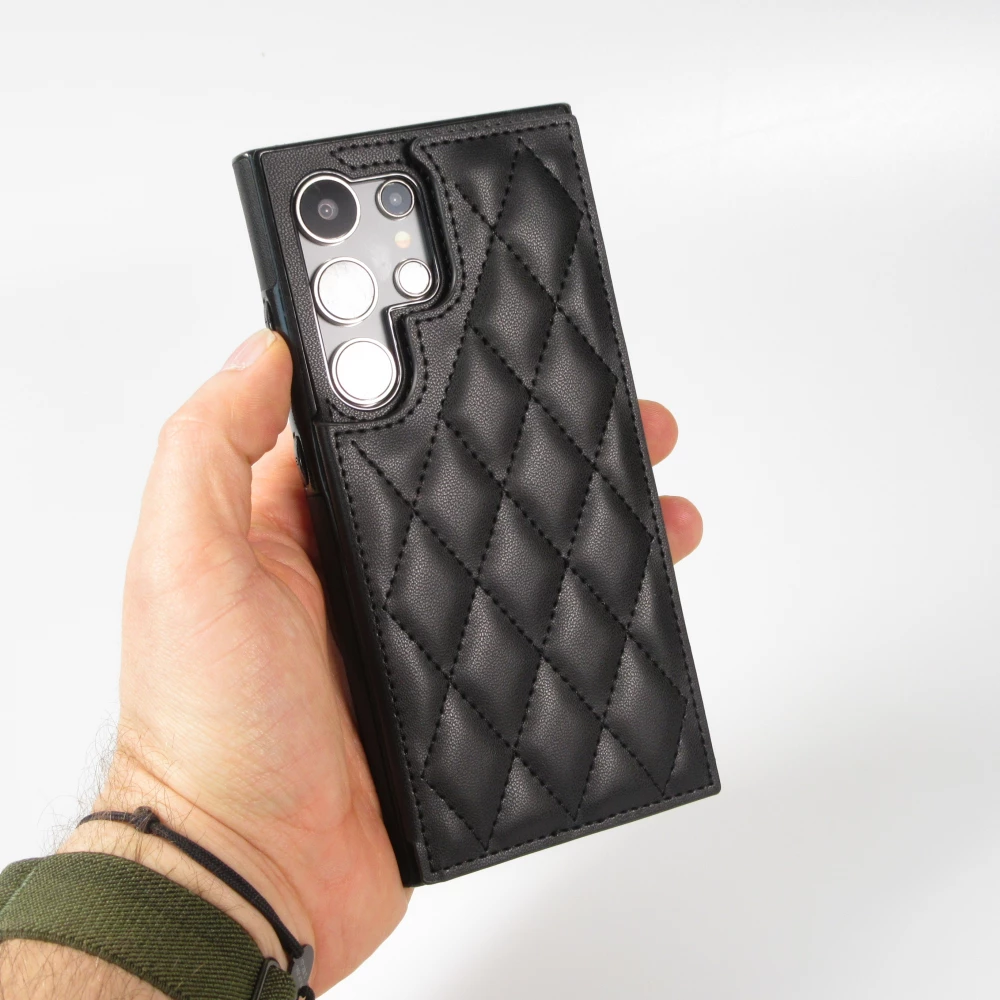 Coque Samsung Galaxy S24 Ultra - Etui en silicone avec surface en similicuir et porte-monnaie pliable - Noir
