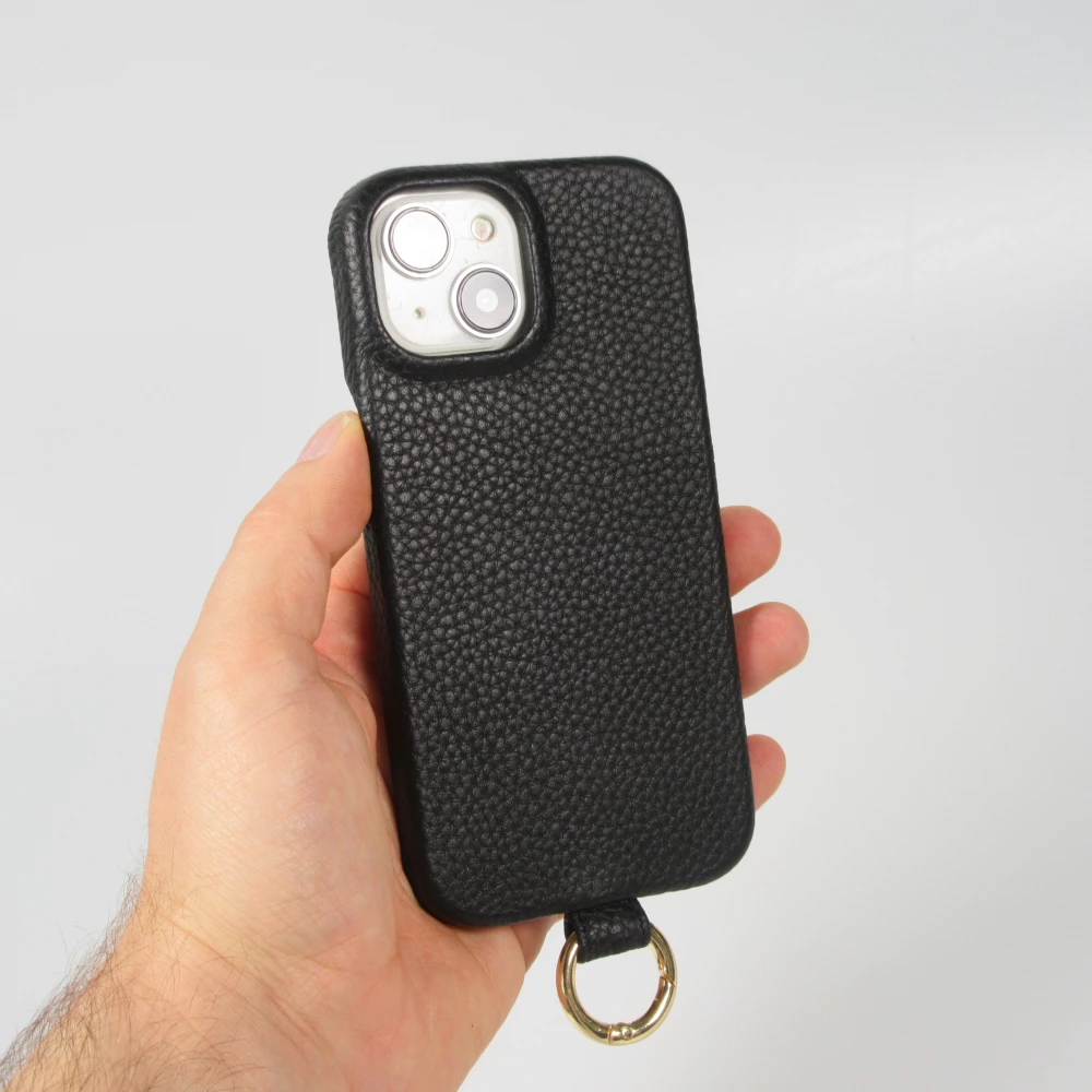 Coque iPhone 14 - Premium cuir v&eacute;ritable de luxe avec lani&egrave;re en cuir r&eacute;glable et amovible + MagSafe - Noir