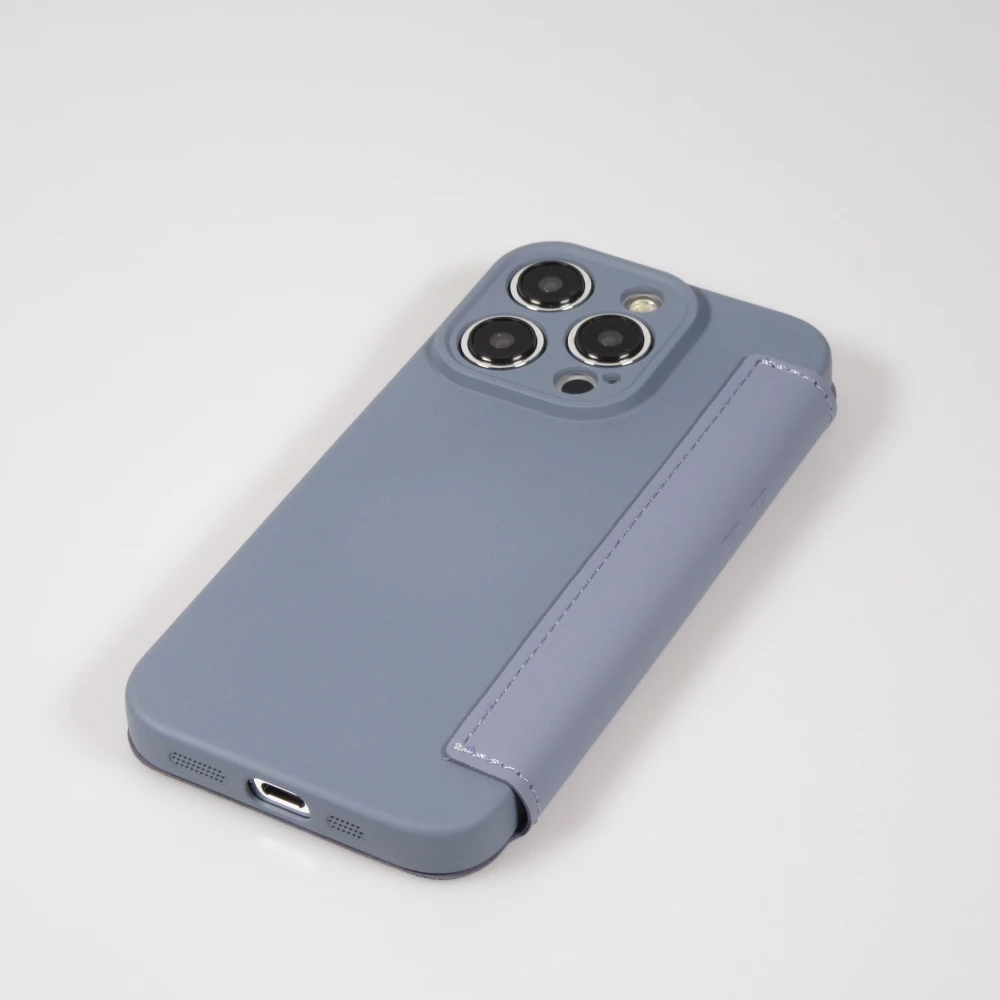 Fourre iPhone 15 Pro Max - Flip silicone souple avec surface lisse et mate - Gris