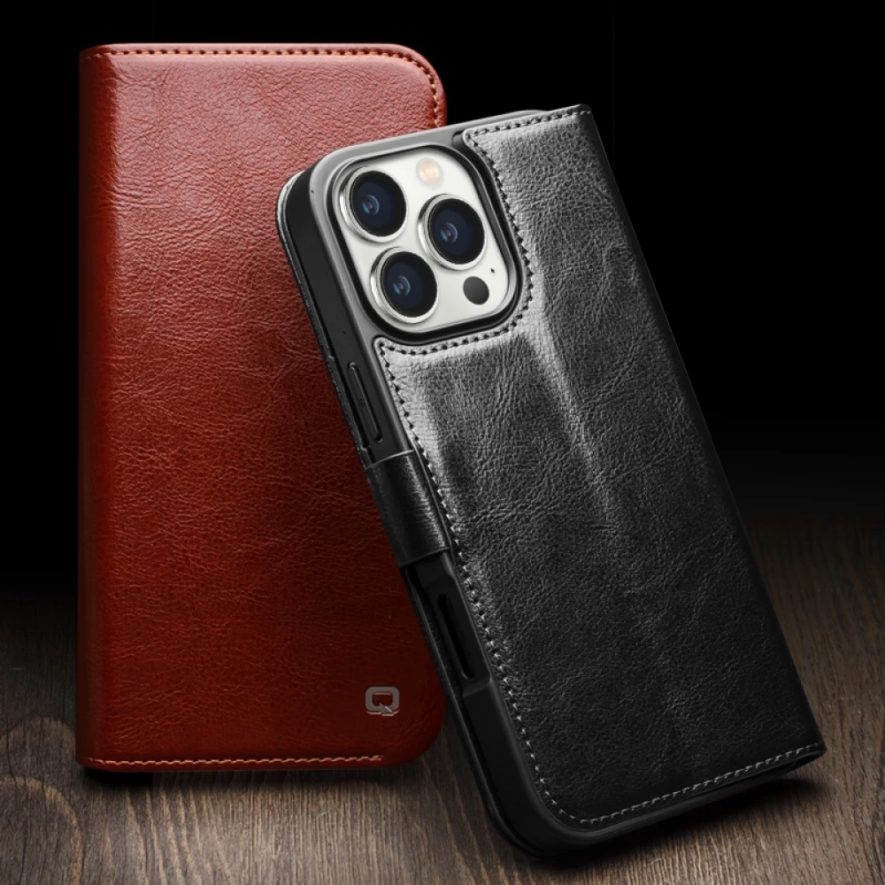 Fourre iPhone 16 - Flip Qialino cuir véritable avec fermeture magnétique - Noir
