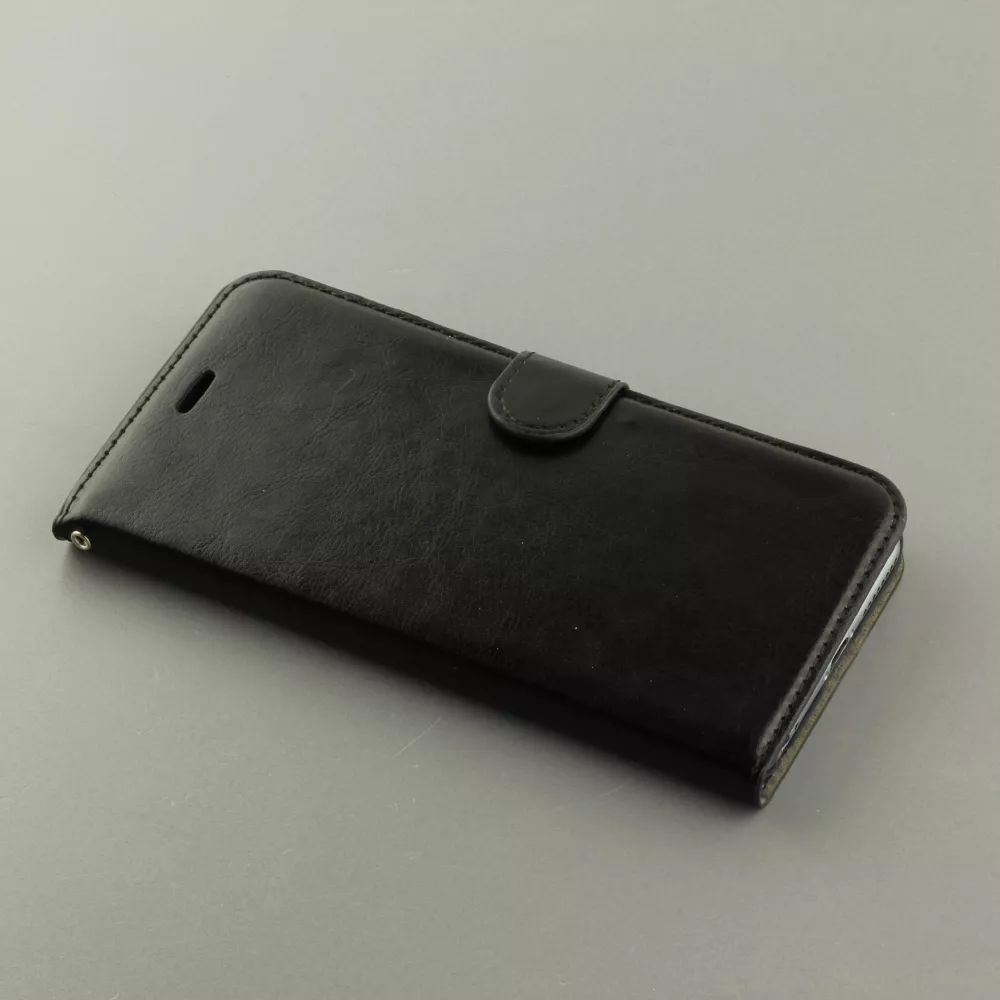 Fourre iPhone 17e / 16e - Premium Flip cuir lisse porte-cartes - Noir