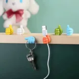 Organisateur de câbles en silicone amusant Thumbs-Up pour les câbles de chargement, les clés, etc. - Blanc