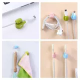 Organisateur de câbles en silicone amusant Thumbs-Up pour les câbles de chargement, les clés, etc. - Blanc