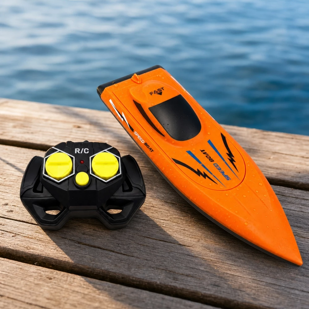 Bateau t&eacute;l&eacute;command&eacute; 2.4 GHz anti-retournement avec coque anti-chocs - Orange