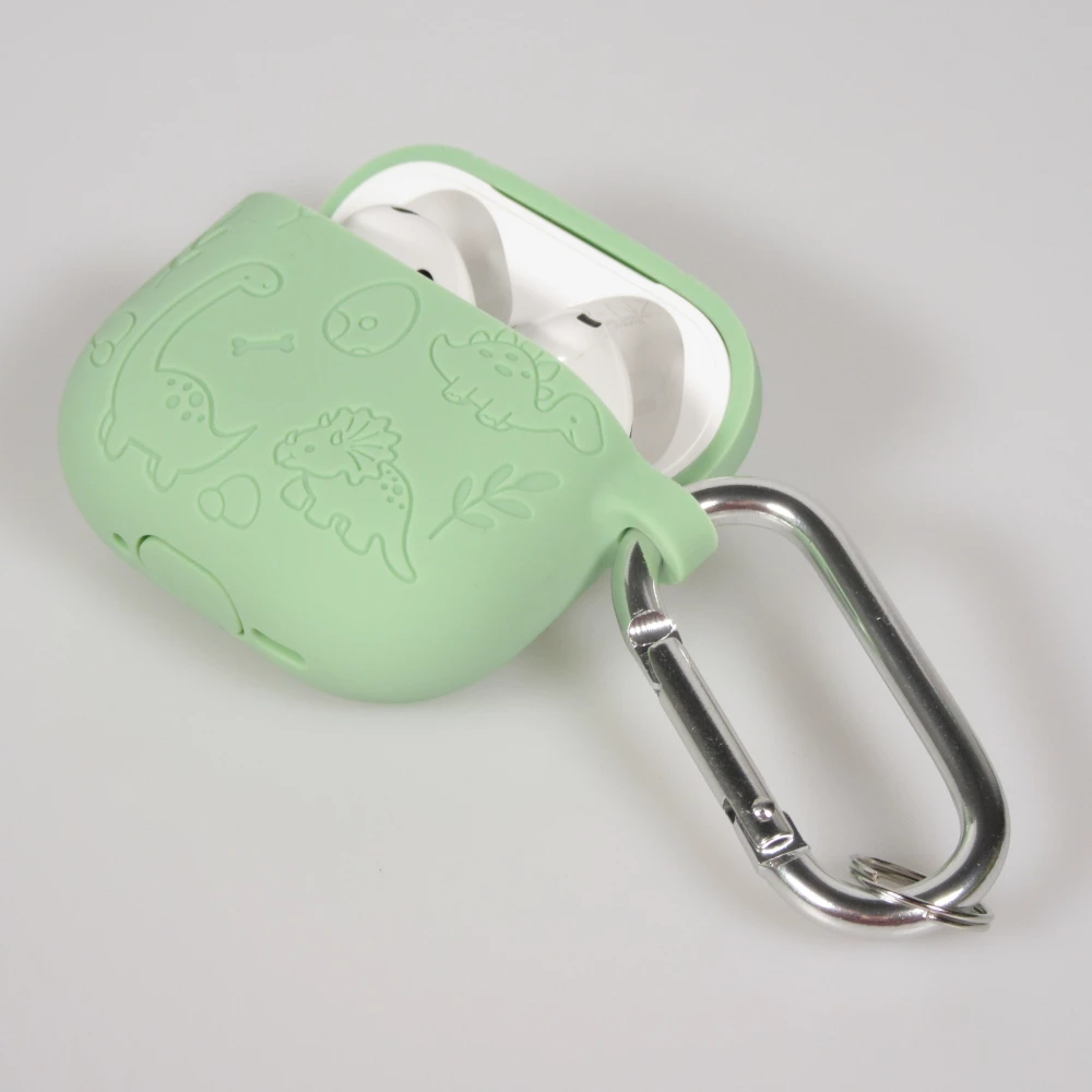 Coque AirPods 4 - Silicone dinosaures et fleurs grav&eacute;s - Vert clair