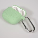 Coque AirPods 4 - Silicone dinosaures et fleurs grav&eacute;s - Vert clair