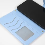 Coque iPhone 16 Pro Max - Flip matelass&eacute; &eacute;l&eacute;gant avec fermeture magn&eacute;tique et lani&egrave;re et emplacements pour cartes - Bleu