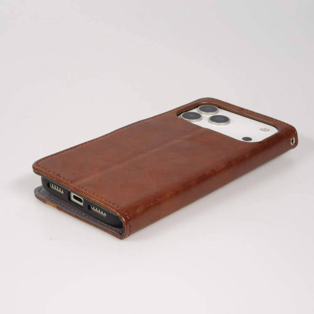 Etui cuir iPhone 17 Pro Max - Flip Wallet en cuir véritable avec stripe design et compartiment à cartes - Brun foncé