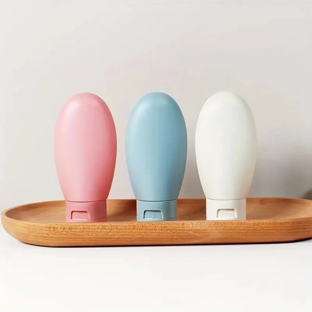 3er Set wiederverwendbare Silikon-Reiseflaschen f&uuml;r Kosmetik und Pflege (60 ml) - Fluggeeignet - Multicolore
